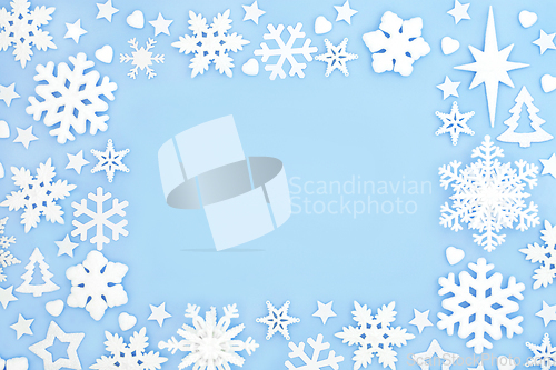 Image of Festive Magical Snowflake and Star Christmas Blue Background