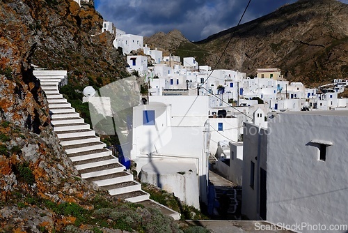 Image of Dramatic view of the town of Chora in Serifos island, Greece under cloudy sky