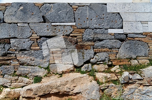 Image of Texture of the ancient stone wall at Karthaia archeological site on Kea island, Greece