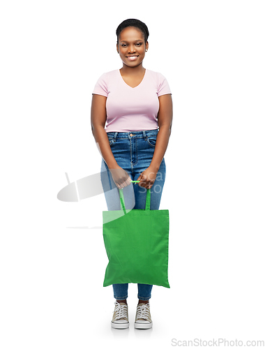 Image of woman with reusable canvas bag for food shopping