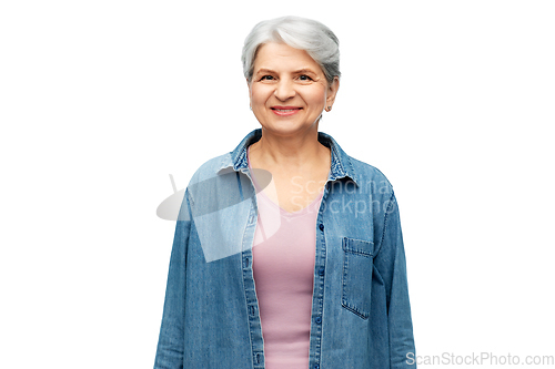 Image of portrait of smiling senior woman in denim shirt