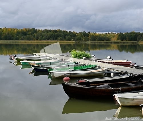 Image of boats at the pier on lake