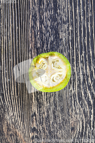 Image of cut green walnut