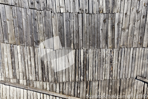 Image of damaged old pine shed