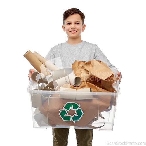 Image of smiling boy sorting paper waste