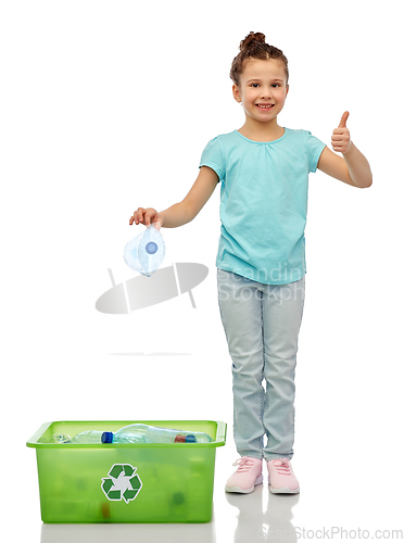 Image of girl sorting plastic waste and showing thumbs up