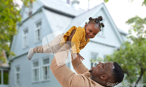 Image of happy african american father with baby daughter