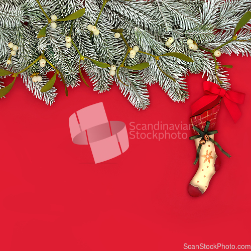 Image of Christmas Stocking for Xmas Eve Snow Fir Background  