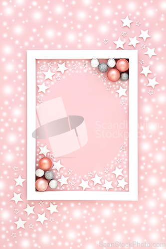 Image of Pink Christmas Background with Snow Stars and Tree Baubles