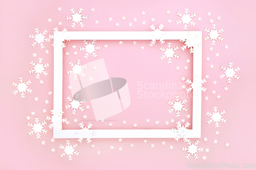 Image of Festive Snowflake Christmas and New Year Background on Pink 
