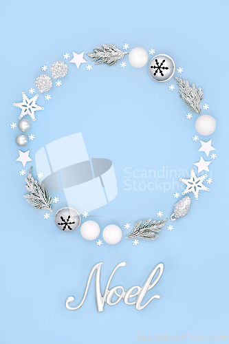 Image of Christmas Wreath and Noel Sign with Traditional Symbols