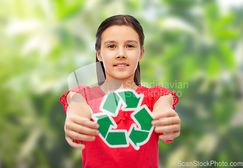 Image of smiling girl holding green recycling sign