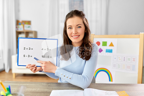 Image of math teacher having online class at home