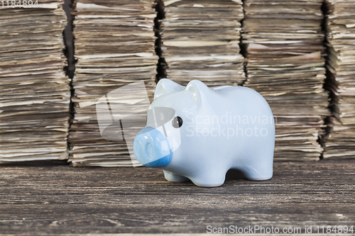 Image of banknotes in a large flat tower