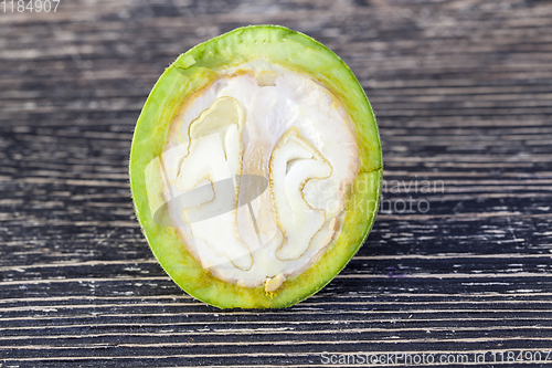 Image of cut green walnut