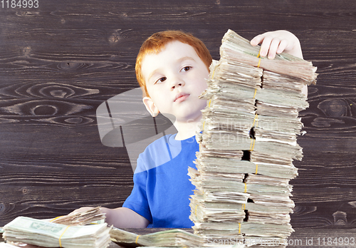 Image of boy builds tower,