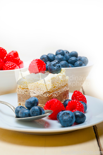 Image of fresh raspberry and blueberry cake