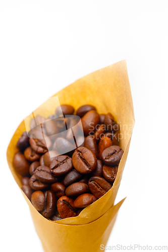 Image of espresso coffee beans on a paper cone