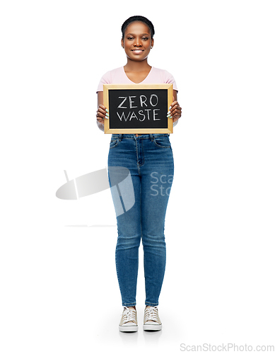 Image of african woman with zero waste words on chalkboard