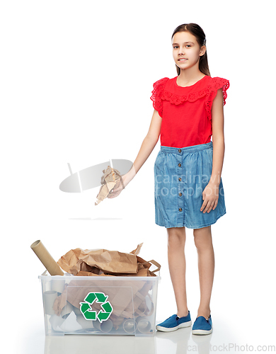 Image of smiling girl sorting paper waste