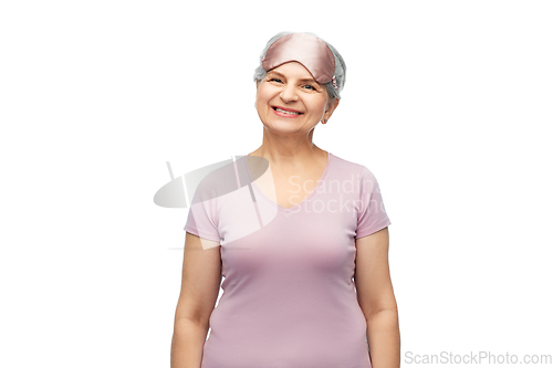 Image of senior woman in pajamas and eye sleeping mask