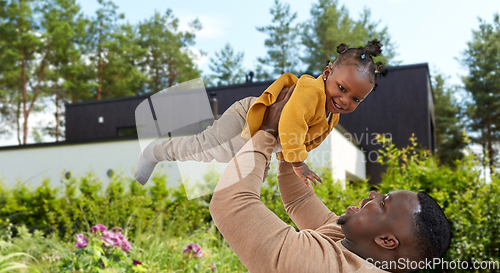 Image of happy african american father with baby daughter