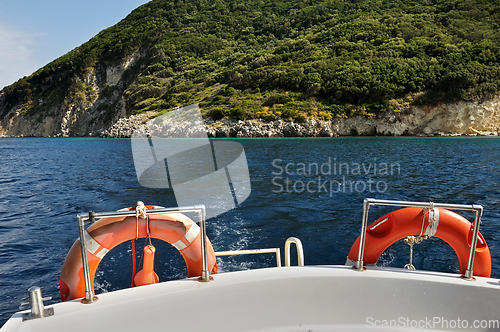 Image of boat stern with life buoys