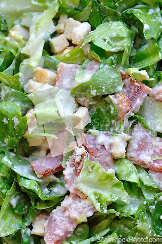 Image of caesar salad with bacon