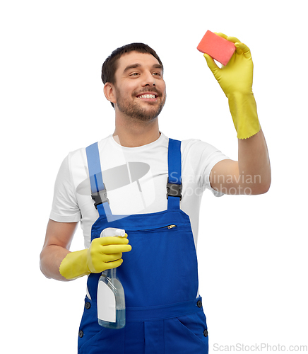 Image of male cleaner cleaning with sponge and detergent