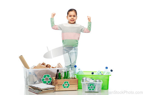 Image of happy girl sorting paper, metal and plastic waste