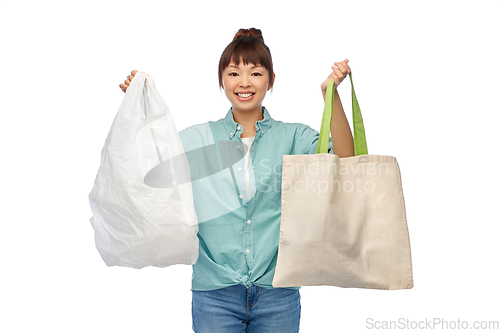 Image of woman with plastic and reusable shopping bag