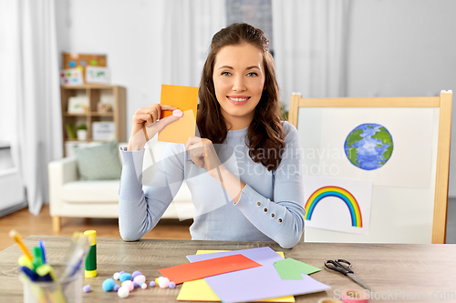 Image of teacher having online class of arts and crafts