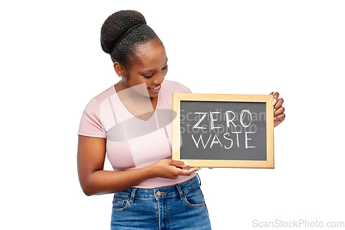 Image of happy woman holds chalkboard with zero waste words