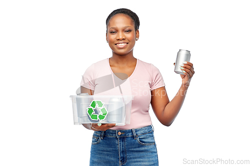 Image of african american woman sorting metallic waste