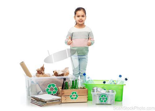 Image of happy girl sorting paper, metal and plastic waste