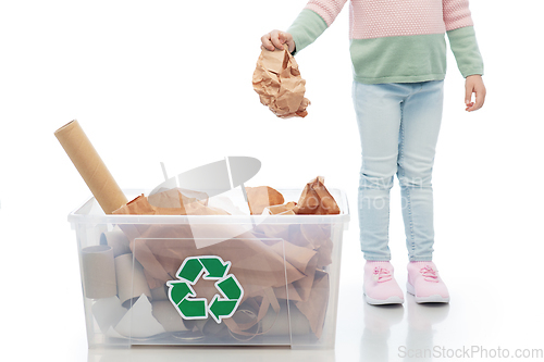 Image of girl sorting paper waste