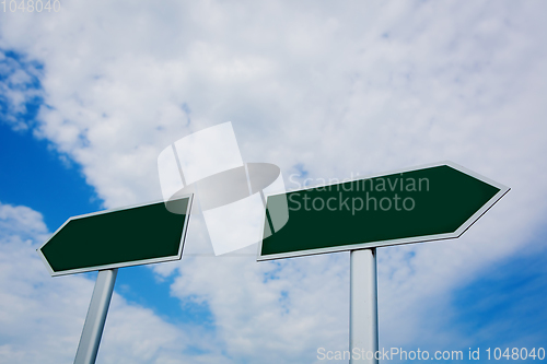 Image of Blank signpost over blue sky