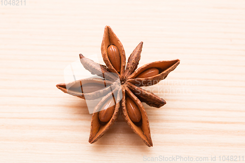 Image of Organic star anise on a wooden table