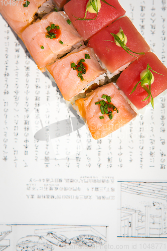 Image of Sushi rolls served on a plate