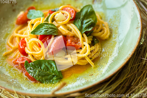 Image of Homemade pasta with Basil and tomatoes