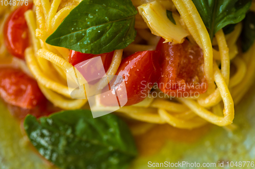 Image of Homemade pasta with Basil and tomatoes