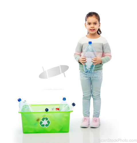 Image of smiling girl sorting plastic waste