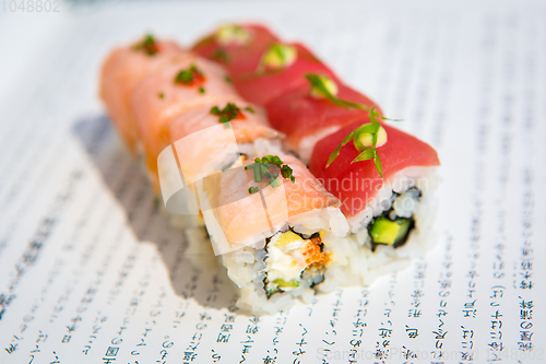 Image of Sushi rolls served on a plate