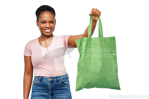 Image of woman with reusable canvas bag for food shopping