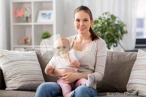 Image of close up of mother with baby drinking water