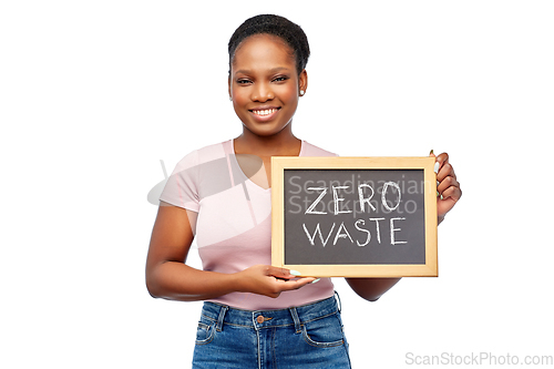 Image of happy woman holds chalkboard with zero waste words