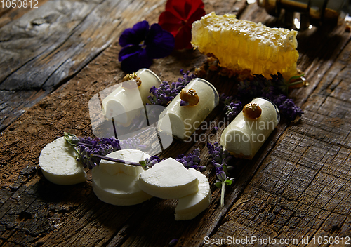 Image of A sweet snack from cheeses. Food for wine and romantic, cheese delicatessen. Menu design horizontal. Film effect.