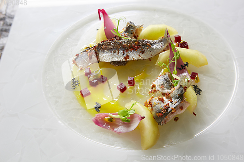 Image of Salted Fish with Boiled Potato and Pickled Onions