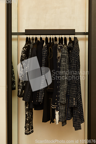 Image of luxury and fashionable brand new interior of cloth store