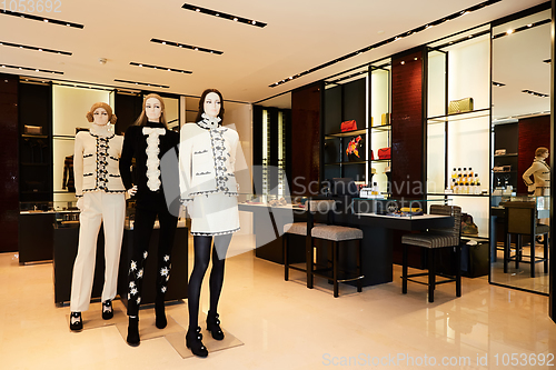 Image of Women mannequins in luxury clothes shop